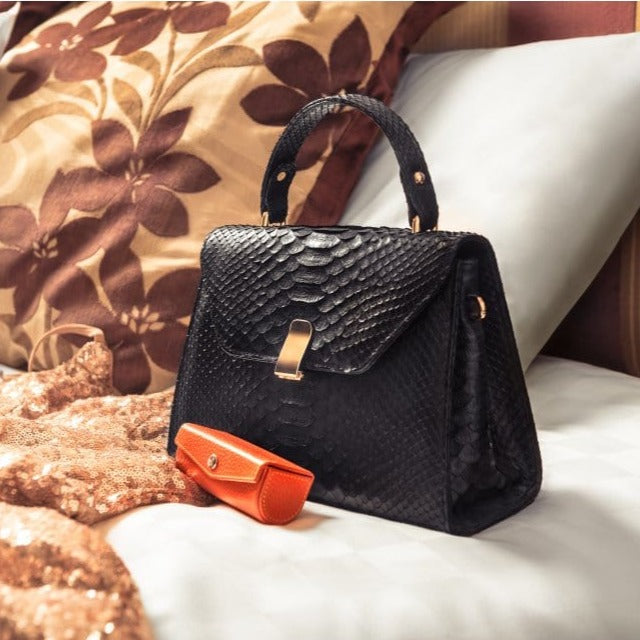 Leather lipstick case. orange, lifestye