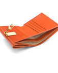 Leather purse with brass clasp, orange, inside