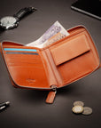 Men's leather zip wallet with coin purse, orange, lifestyle