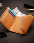 RFID blocking leather envelope purse, orange, lifestyle