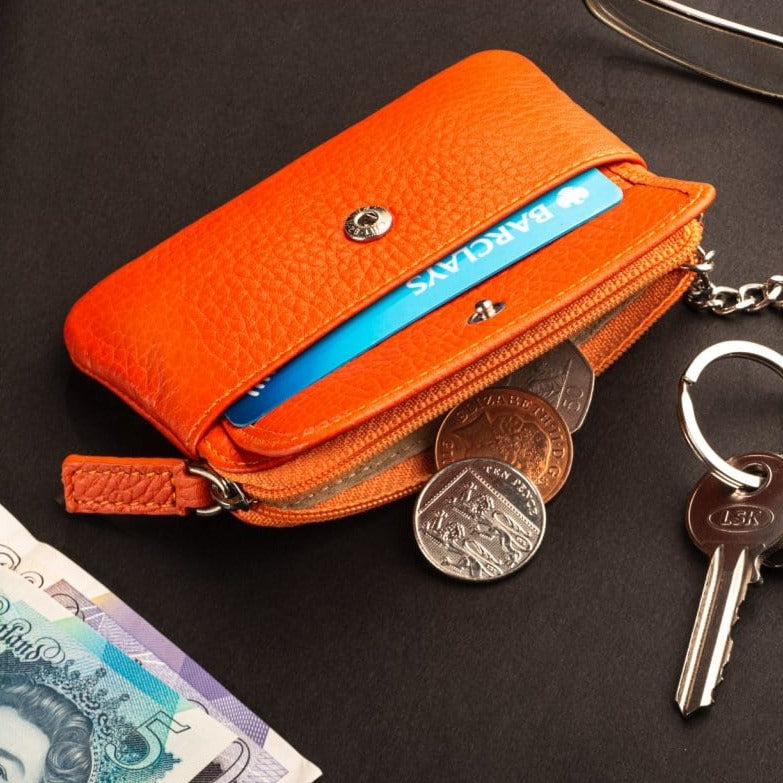 Small leather zip coin purse, orange, lifestyle