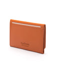 Leather tri-fold travel card holder, orange, back