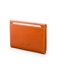 Leather tri-fold travel card holder, orange with red, back