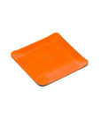 Small leather valet tray, orange with red, reverse