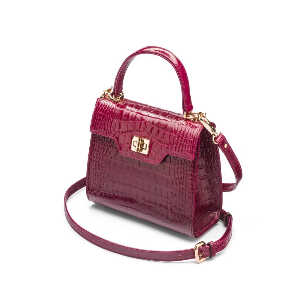 Mini leather Morgan Bag, top handle bag, pink croc, side view