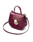 Leather rounded bottom top handle bag, pink croc, side