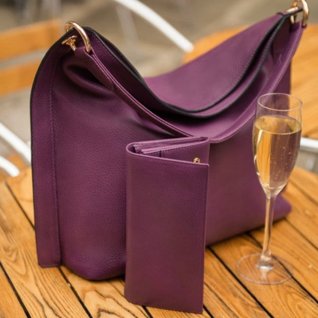 Leather Mayfair concertina purse, purple, lifestyle