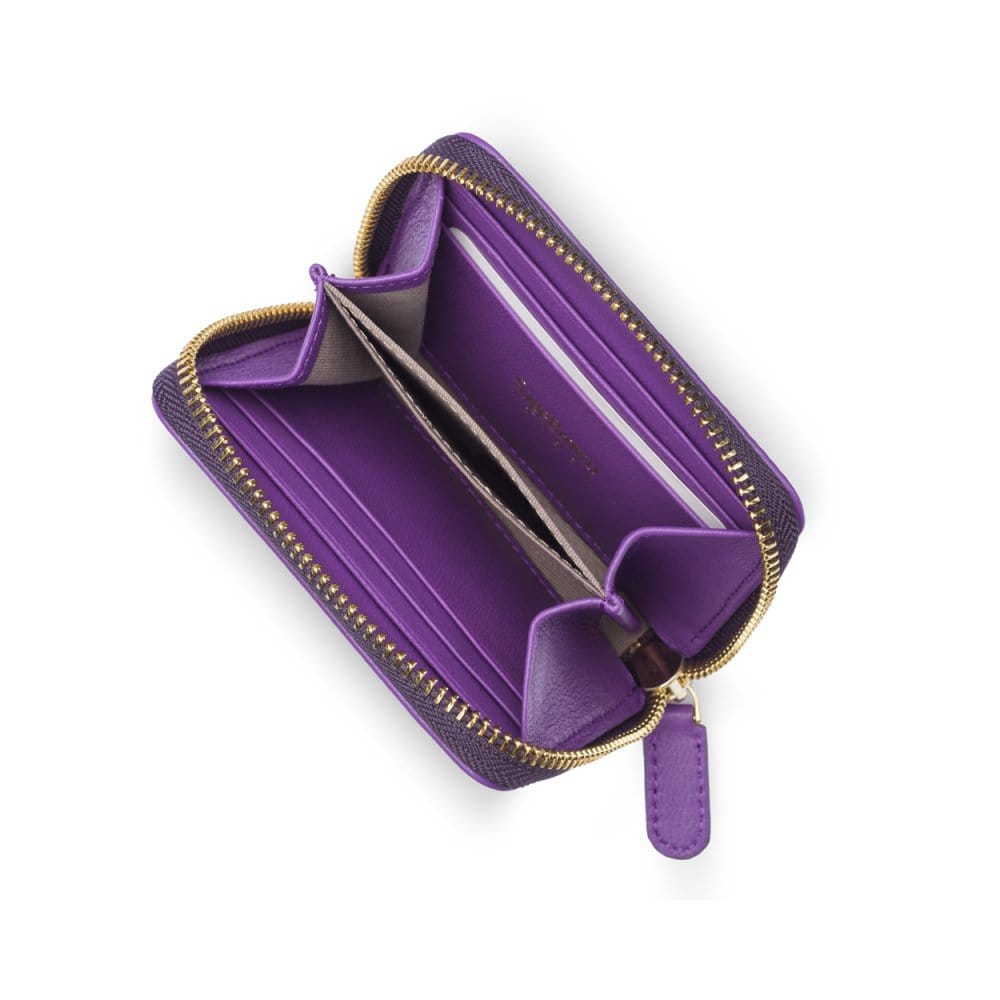 Small zip around woven leather accordion purse, purple, interior