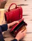 Tall leather zip around accordion purse, red croc, lifestyle