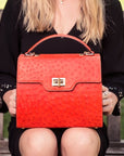 Real ostrich top handle bag, red, lifestyle