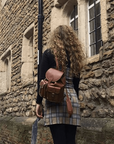 Small leather backpack, tan, lifestyle