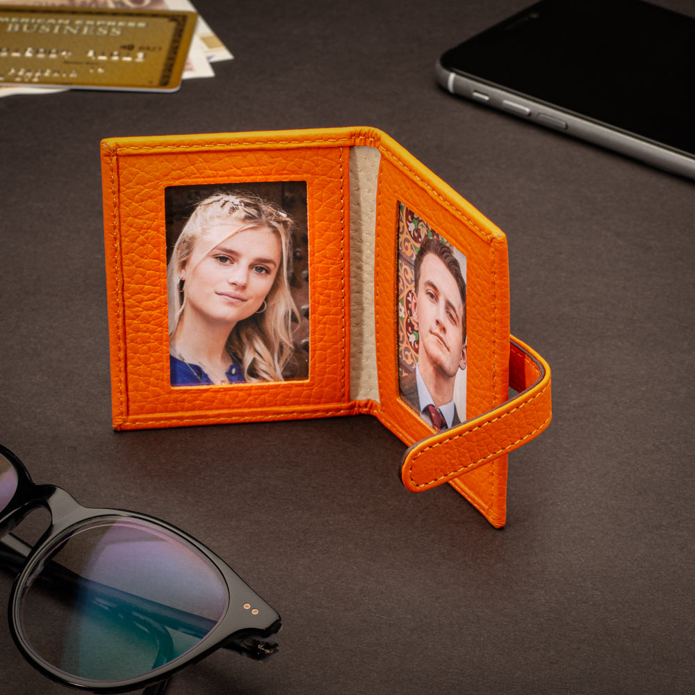 Mini leather passport photo frame, orange, 60 x 40mm, lifestyle