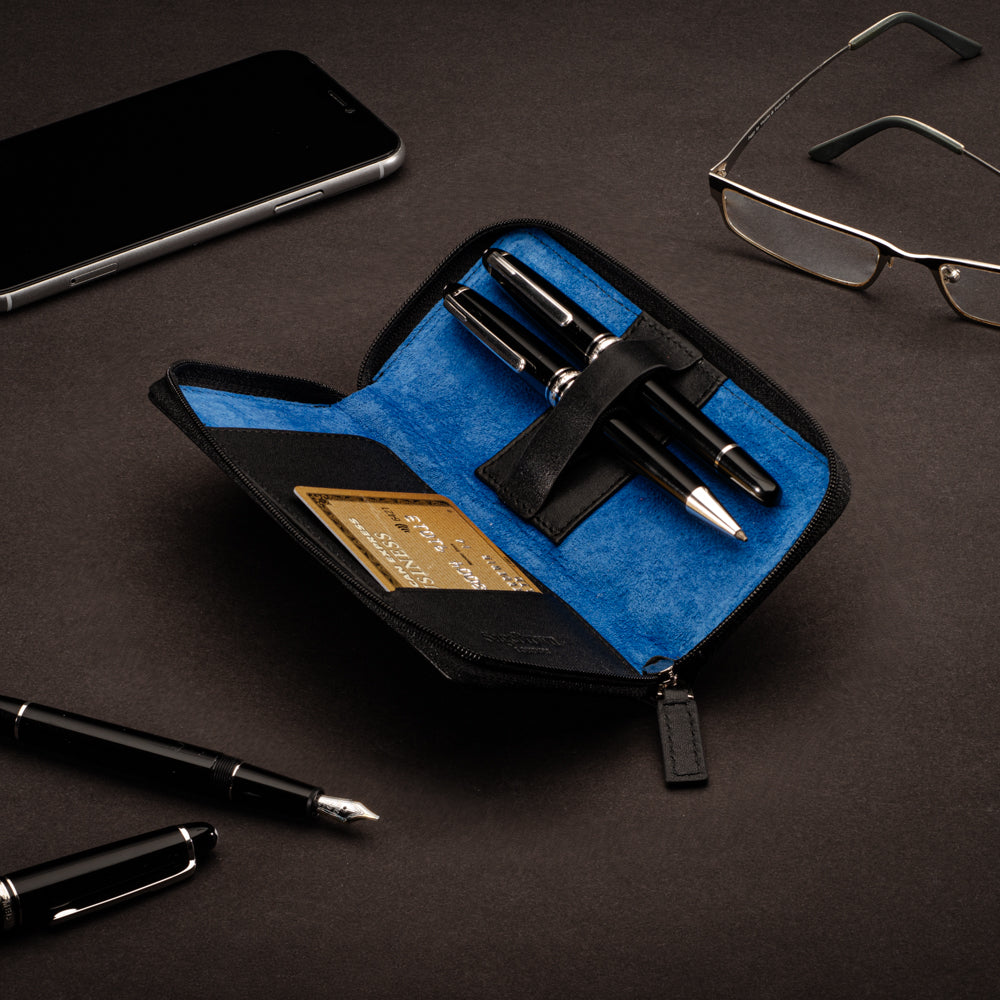 Leather zip around triple pen case, black with cobalt, lifestyle