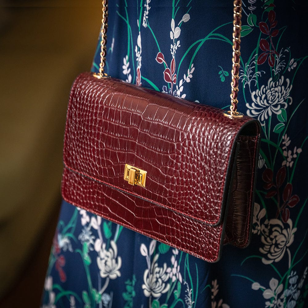 Small leather chain bag, burgundy croc, lifestyle view