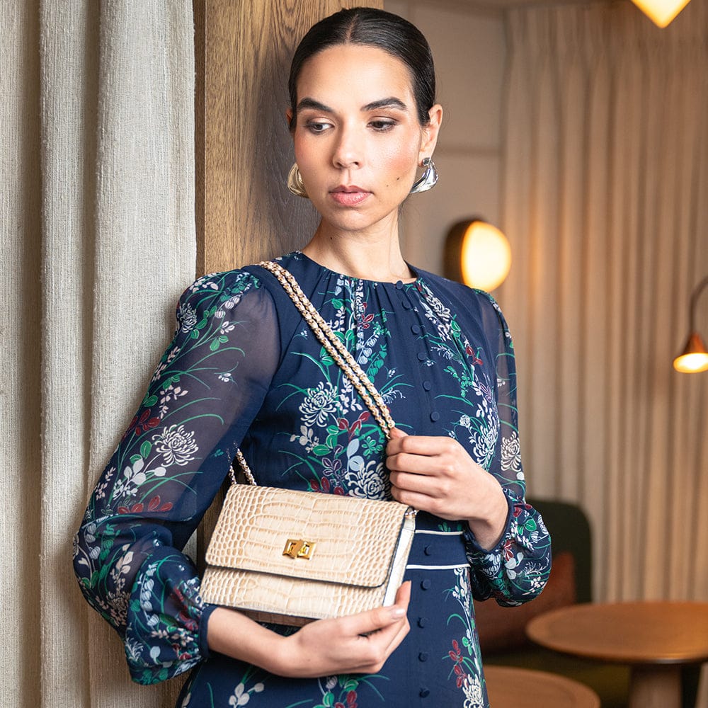 Mini Julia bag with chain strap, ivory croc, lifestyle view