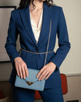 Small leather envelope chain bag, light blue, lifestyle