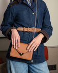 Small envelope shoulder bag, tan, lifestyle