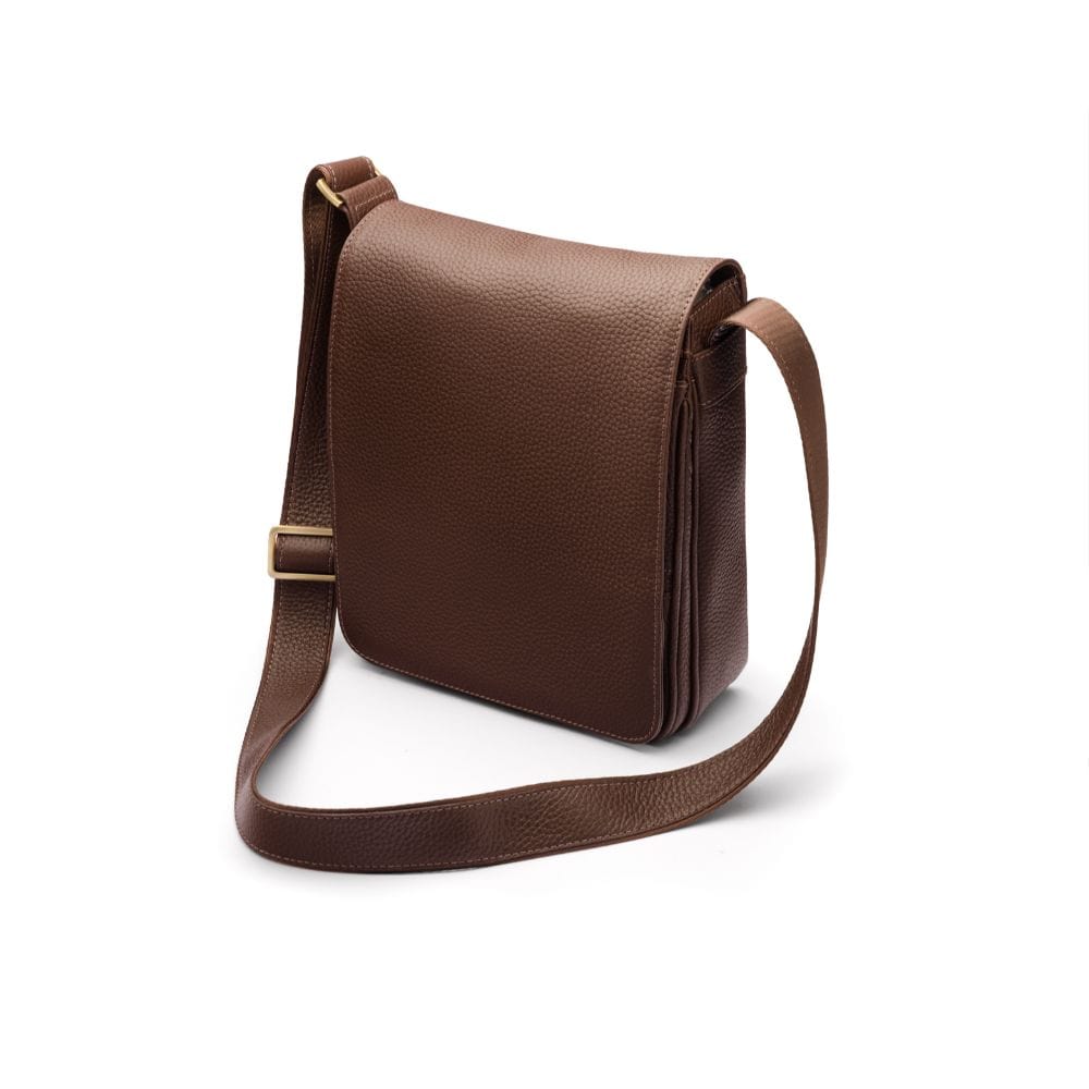 A4 portrait medium leather messenger bag, brown pebble grain, side