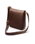 A4 portrait medium leather messenger bag, brown pebble grain, side