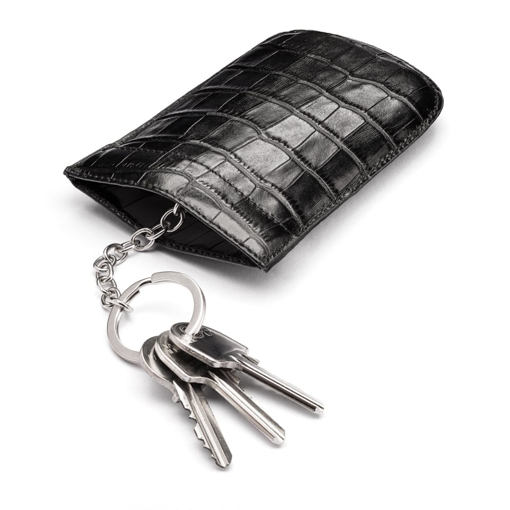 Leather key case with squeeze spring opening, black croc, open