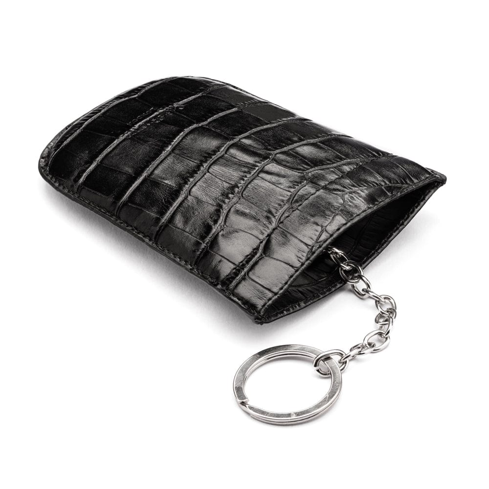 Leather key case with squeeze spring opening, black croc, back