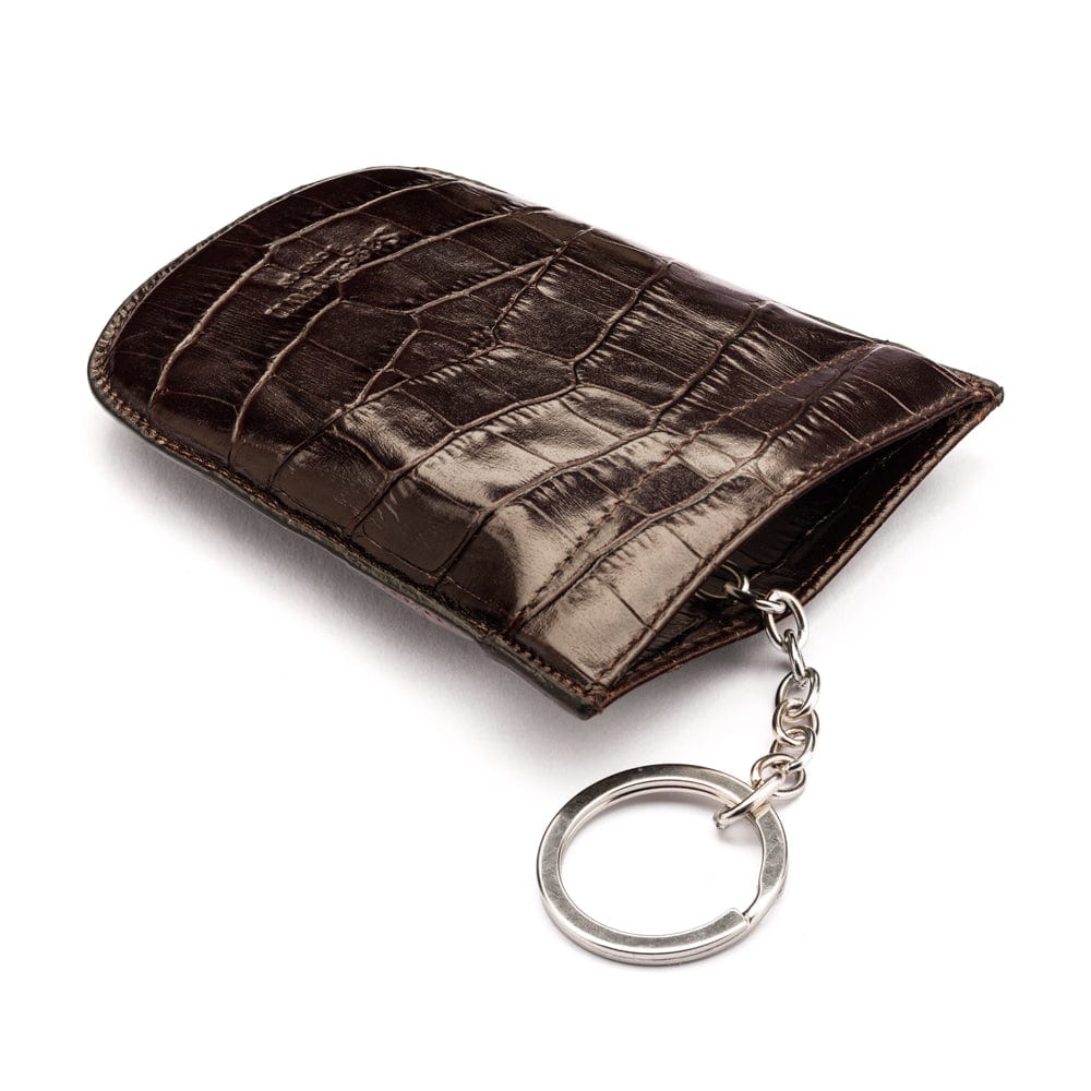 Leather key case with squeeze spring opening, brown croc, back