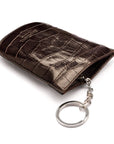 Leather key case with squeeze spring opening, brown croc, back