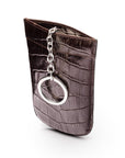 Leather key case with squeeze spring opening, brown croc, front