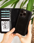 iPhone 15 Pro case in leather with RFID, black, lifestyle