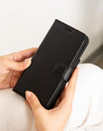 iPhone 15 Pro case in leather with RFID, black, lifestyle view