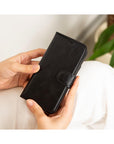 iPhone 15 Pro Max case in leather with RFID, black, lifestyle view