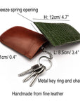 Leather key case with squeeze spring opening, features and dimensions
