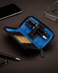 Leather zip around triple pen case, black with cobalt, lifestyle