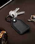 Rectangular leather key fob, black, lifestyle