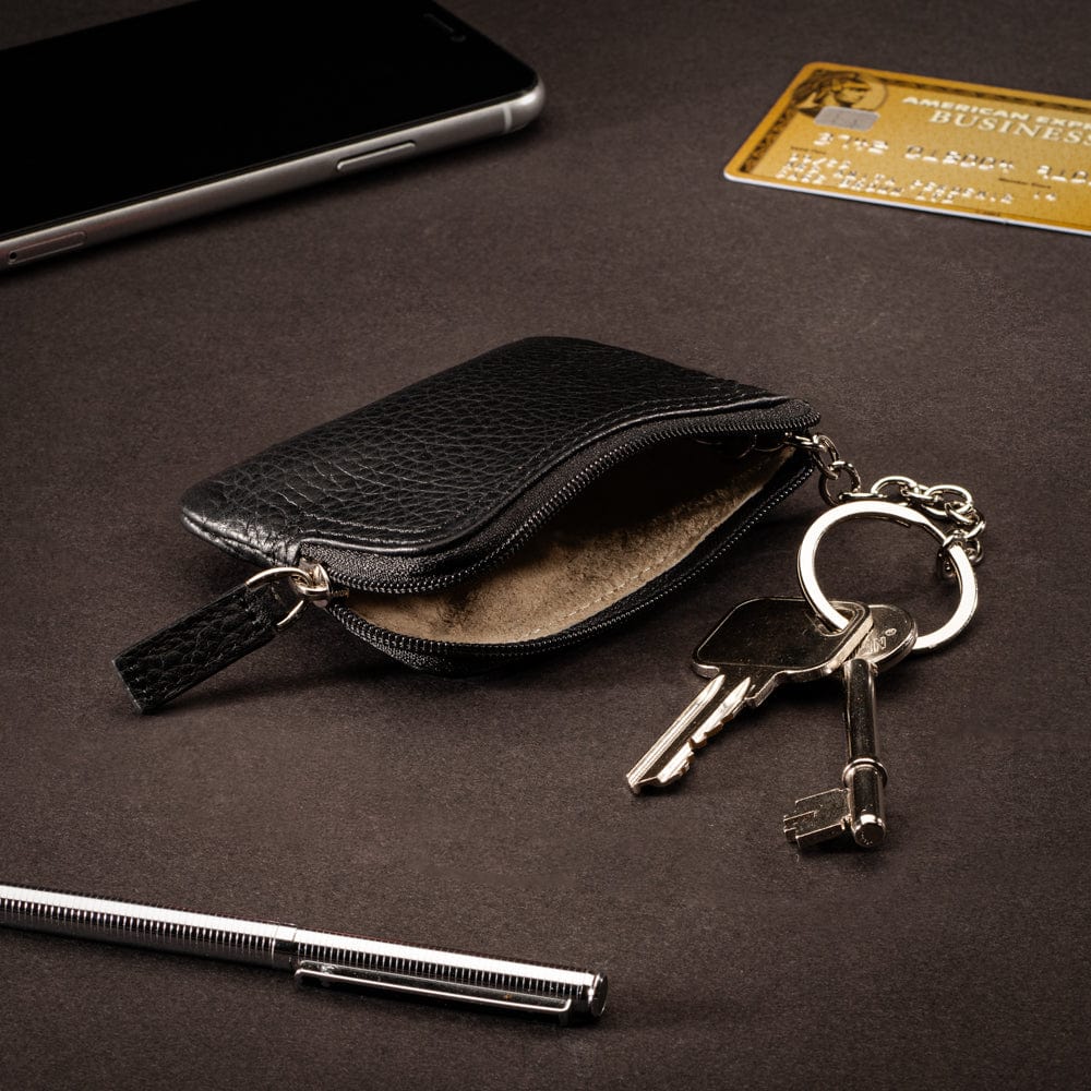 Small leather coin purse with key chain, black, lifestyle