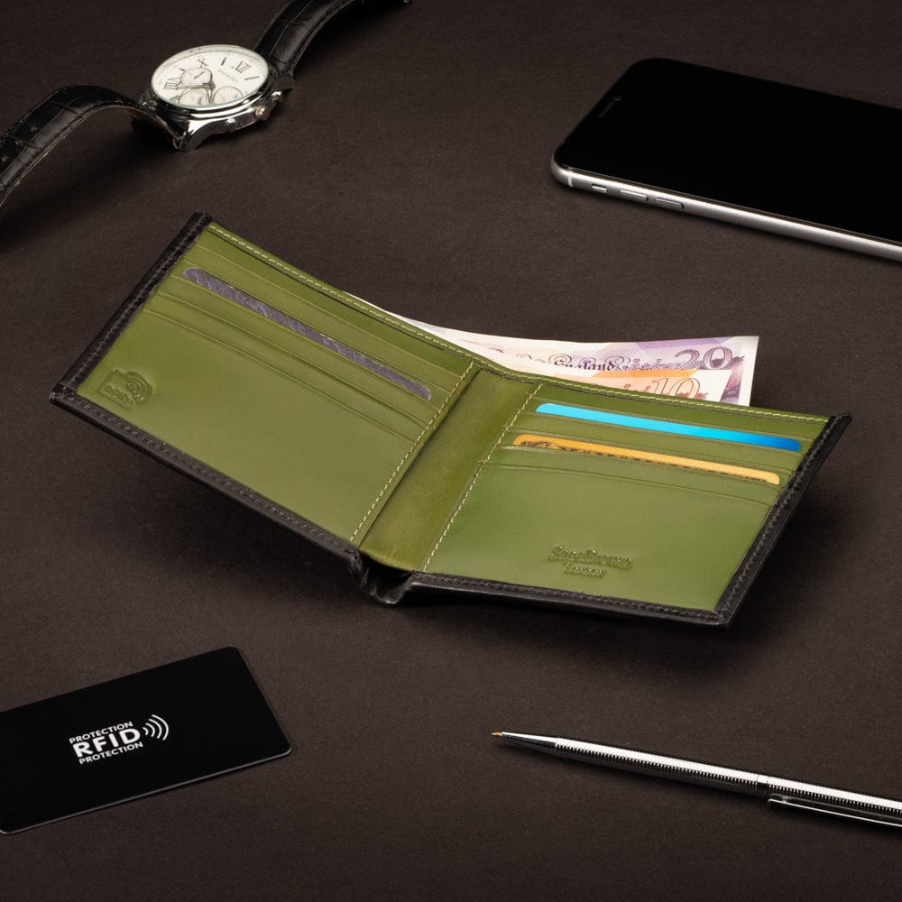 RFID wallet in bridle hide leather, black with lime green, lifestyle