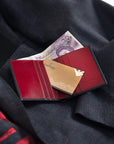 Leather compact billfold wallet 6CC, black with red, lifestyle