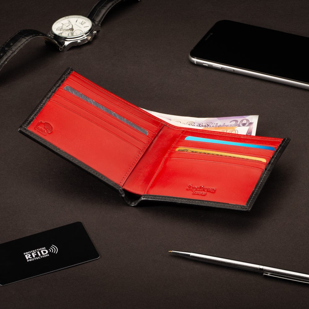 RFID wallet in bridle hide leather, black with red, lifestyle