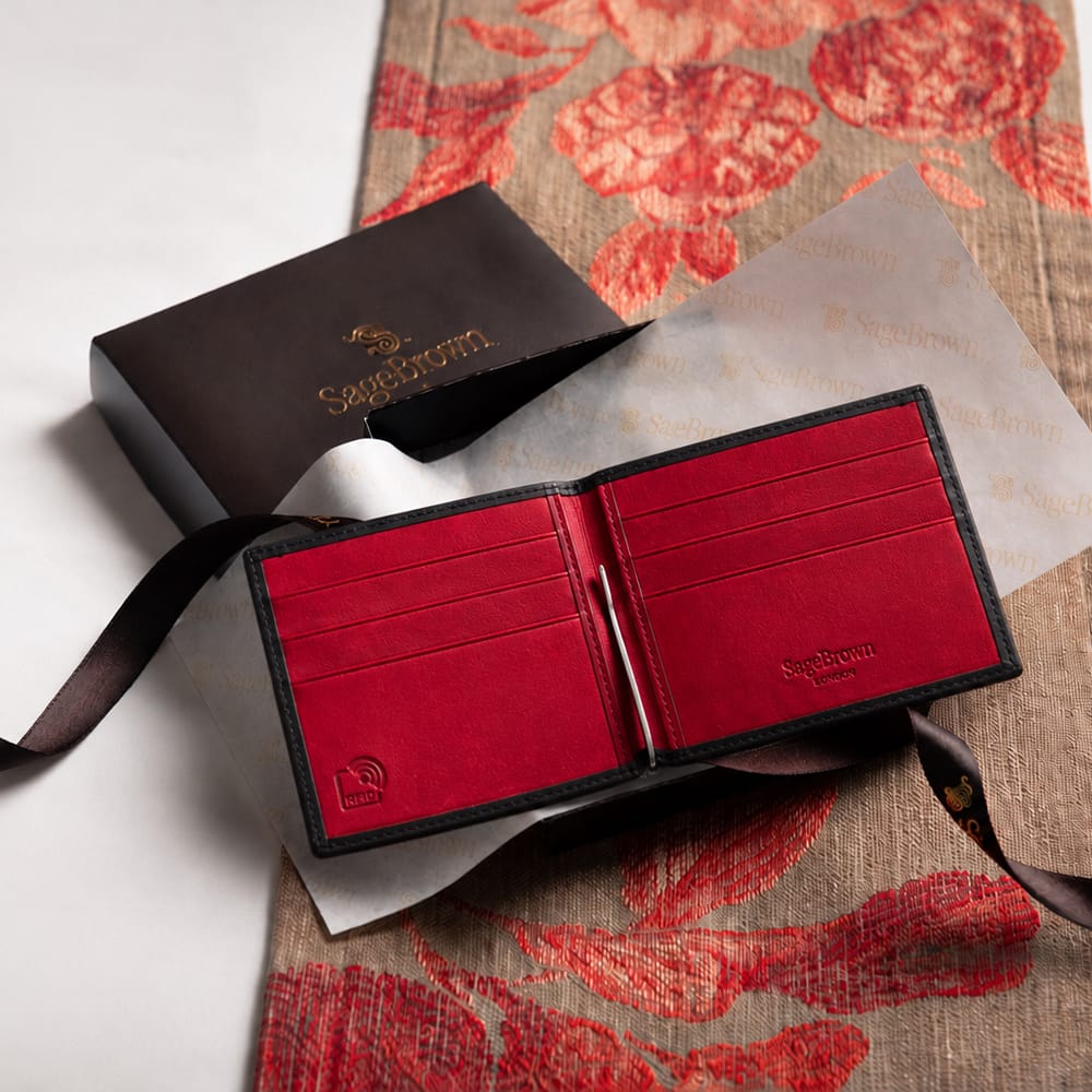 Leather money clip wallet, black with red, lifestyle