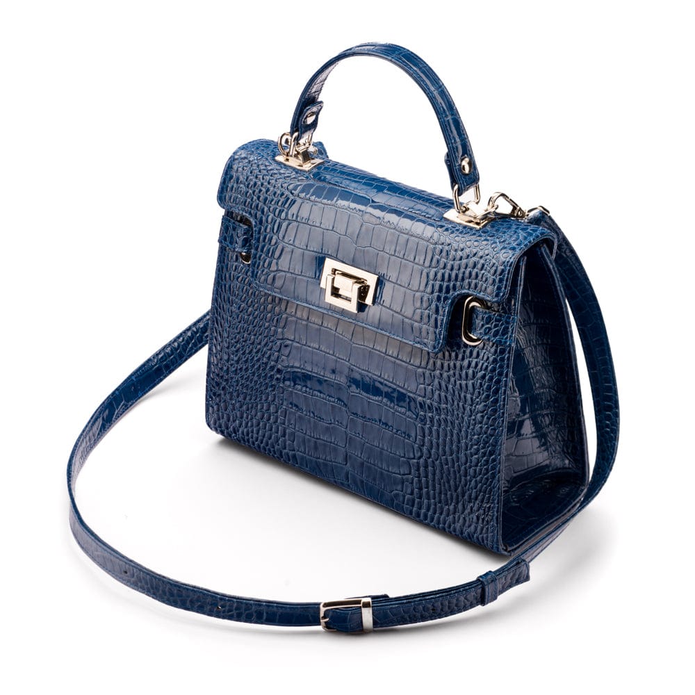 Leather Catherine top handle bag, blue patent croc, side