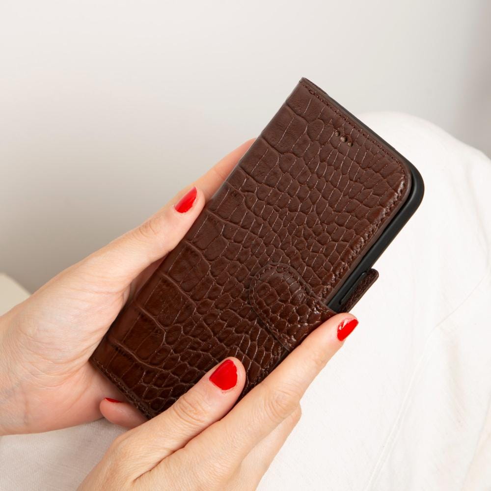 iPhone 15 Pro case in leather with RFID, brown croc, lifestyle view