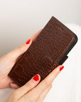 iPhone 15 Pro case in leather with RFID, brown croc, lifestyle view