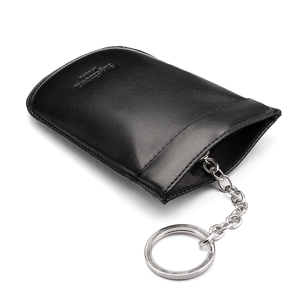 Leather key case with squeeze spring opening, black, back