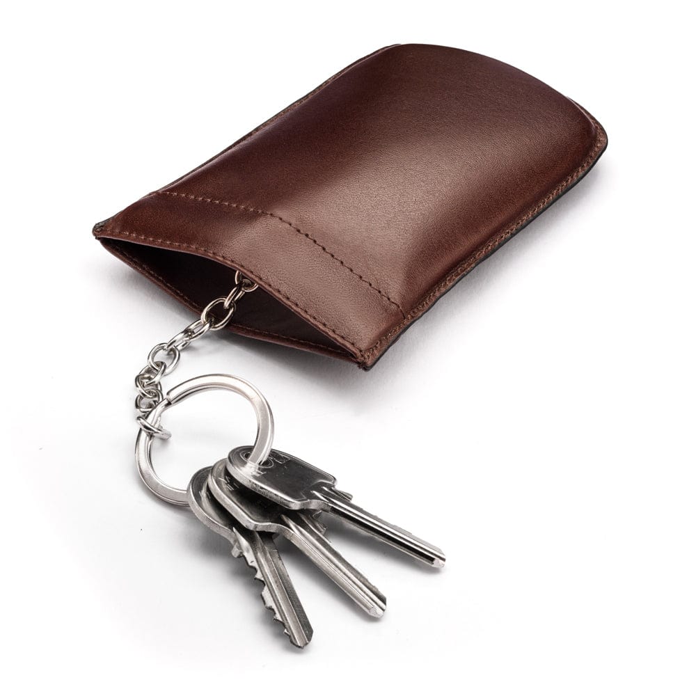 Leather key case with squeeze spring opening, brown, open