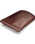 Leather key case with squeeze spring opening, brown, closed