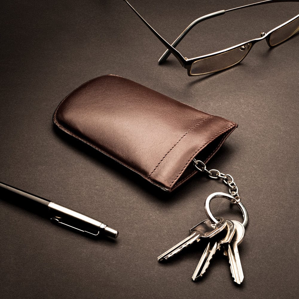 Leather key case with squeeze spring opening, brown, lifestyle
