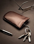 Leather key case with squeeze spring opening, brown, lifestyle