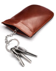 Leather key case with squeeze spring opening, dark tan, open