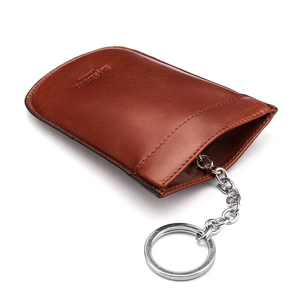 Leather key case with squeeze spring opening, dark tan, back