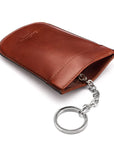 Leather key case with squeeze spring opening, dark tan, back